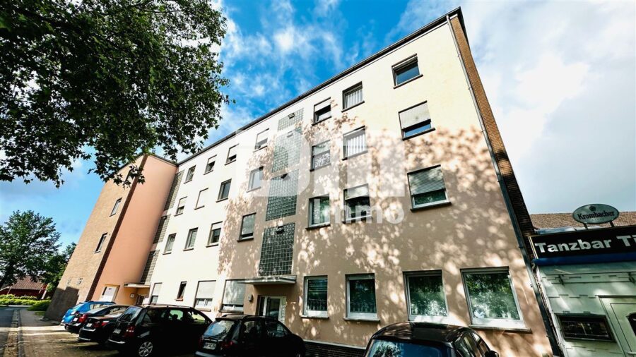 Umfassend sanierte EG Wohnung BJ in gepflegtem Wohn- / Gewerbeensemble - Frontansicht - Haupteingang